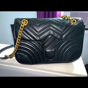 Black evening crossbody bag with gold detail